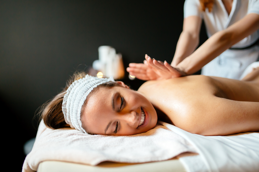 Beautiful woman enjoying massage treatment
